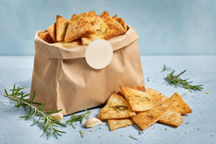 Kraft bag of rosemary and garlic homemade pita chips